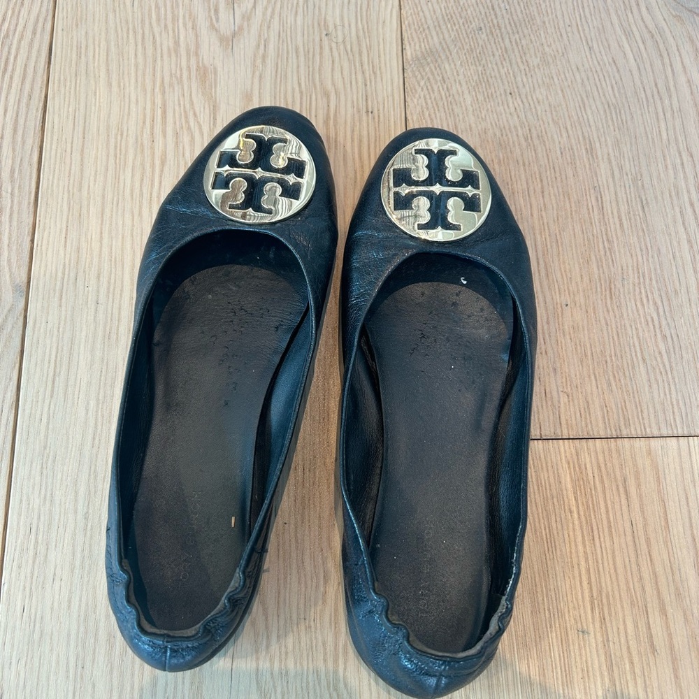 Tory Burch Black Flats with Gold Emblem